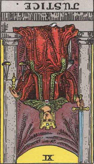 The Reversed Justice Tarot Card From The Rider-Waite Tarot Deck.